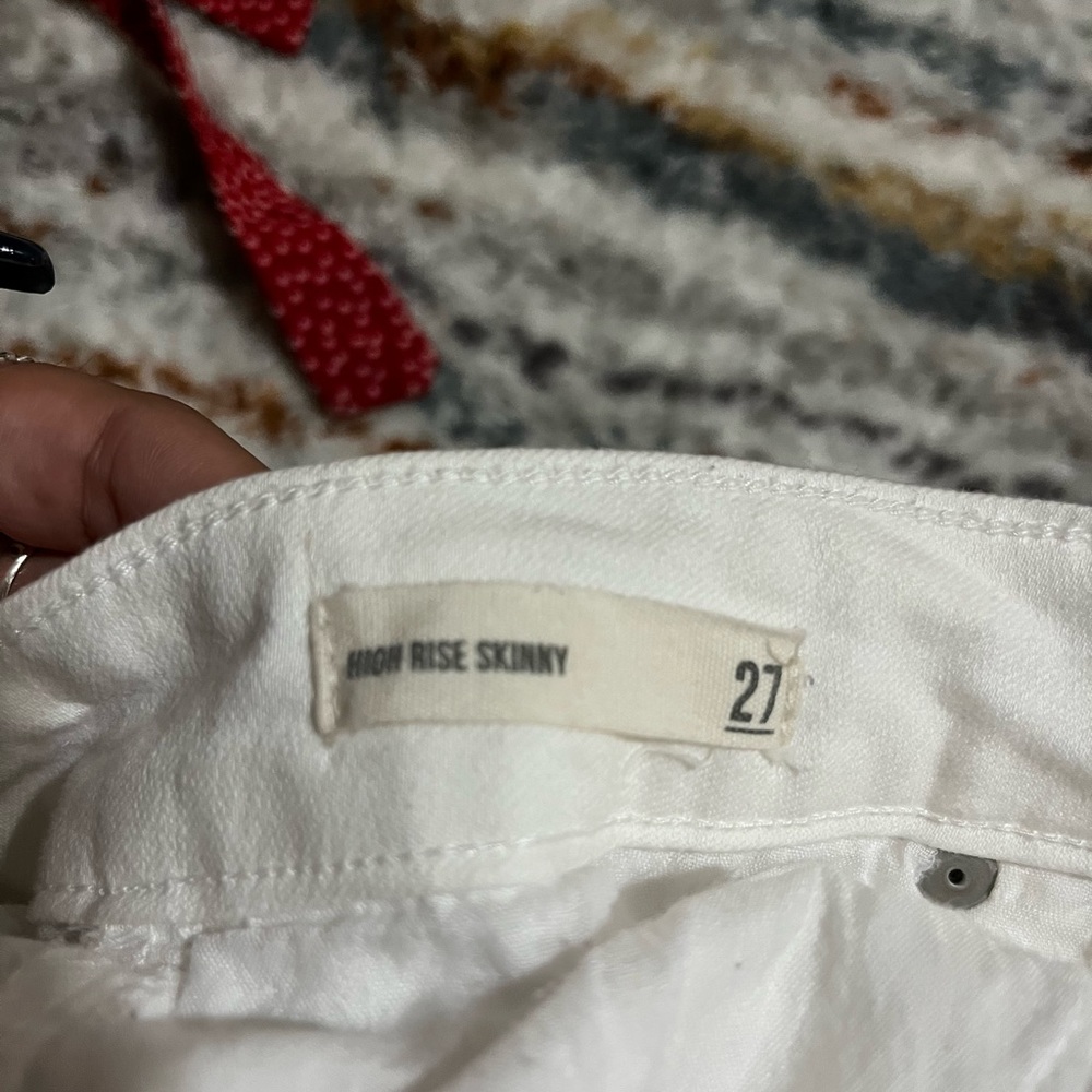 Francesca’s white ripped skinny jeans
